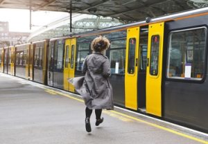 Woman running for train